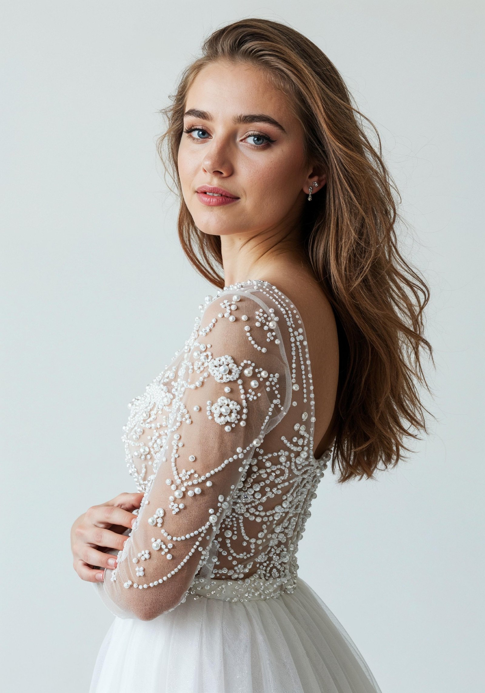 Beautiful Young Woman in Luxury White Pearl Embellished Dress Fashion Portrait