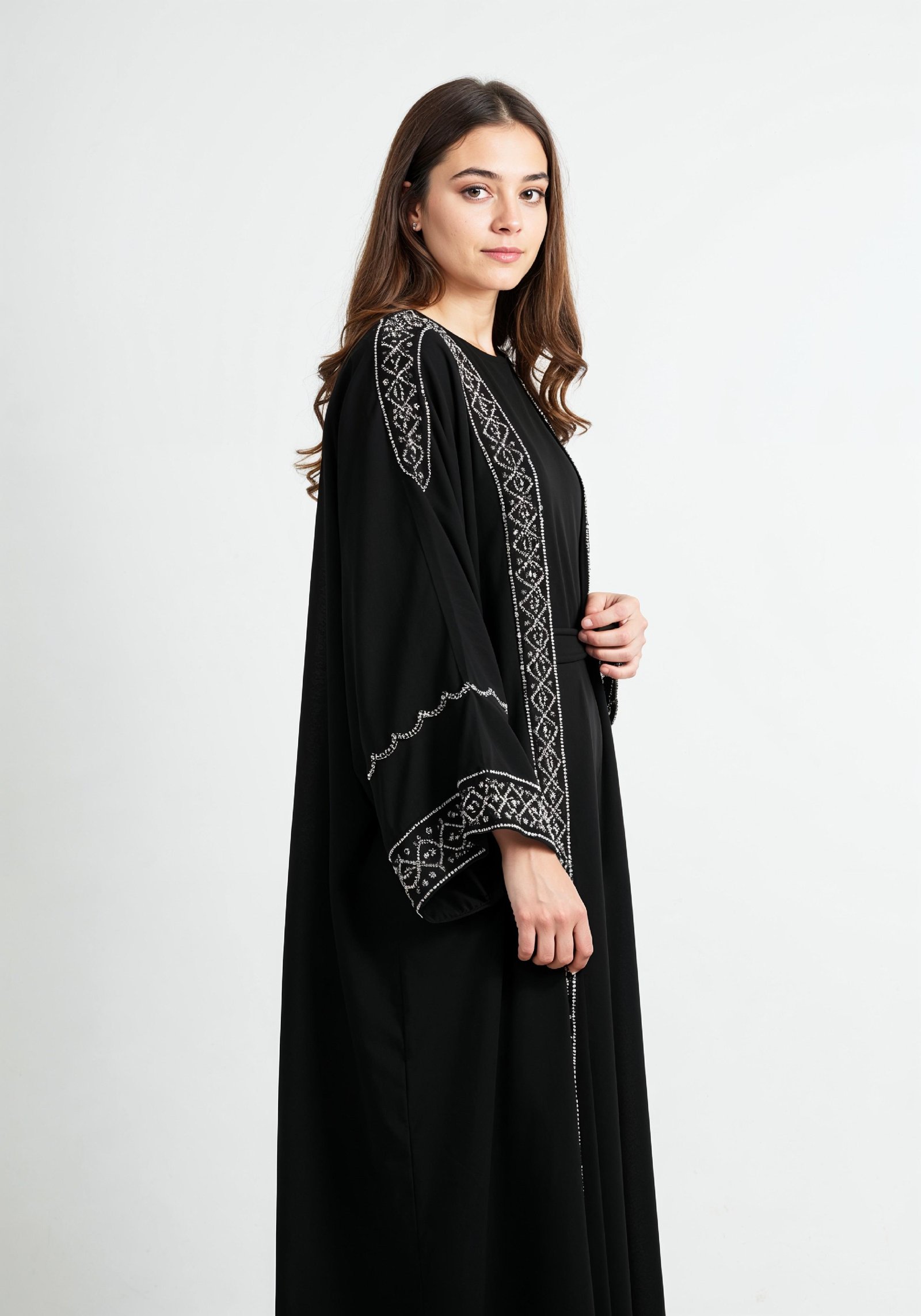 Elegant Muslim Woman in Black Embroidered Abaya and Hijab Full Length Fashion Portrait