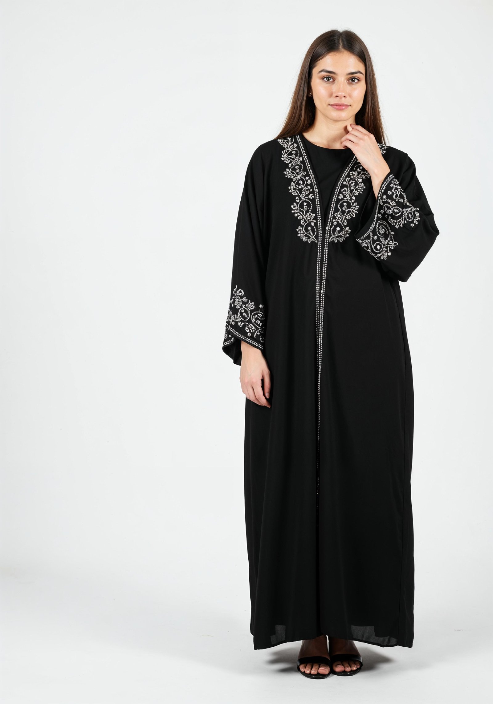 Elegant Muslim Woman in Black Embroidered Abaya and Hijab Full Length Fashion Portrait