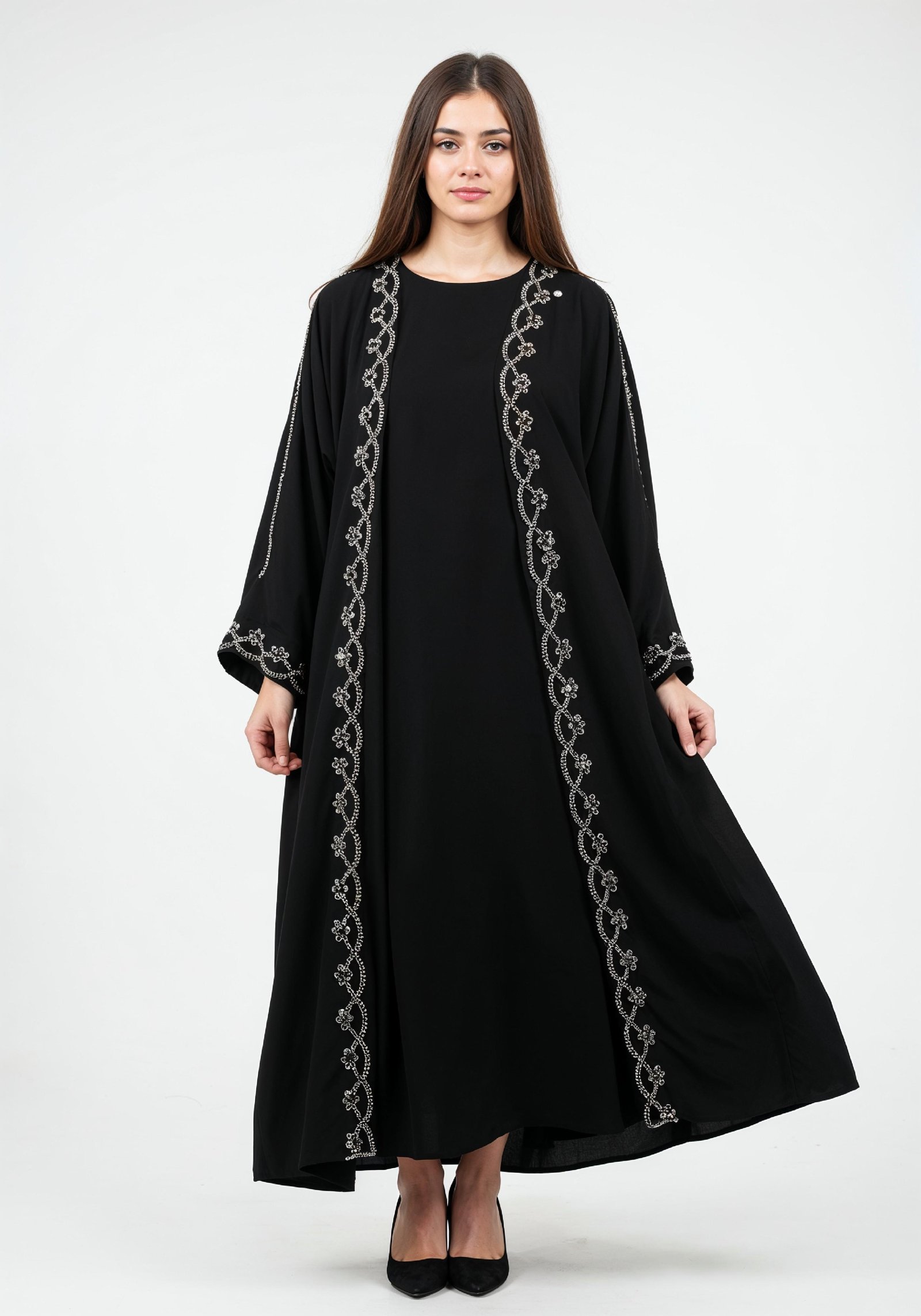 Elegant Muslim Woman in Black Embroidered Abaya and Hijab Full Length Fashion Portrait