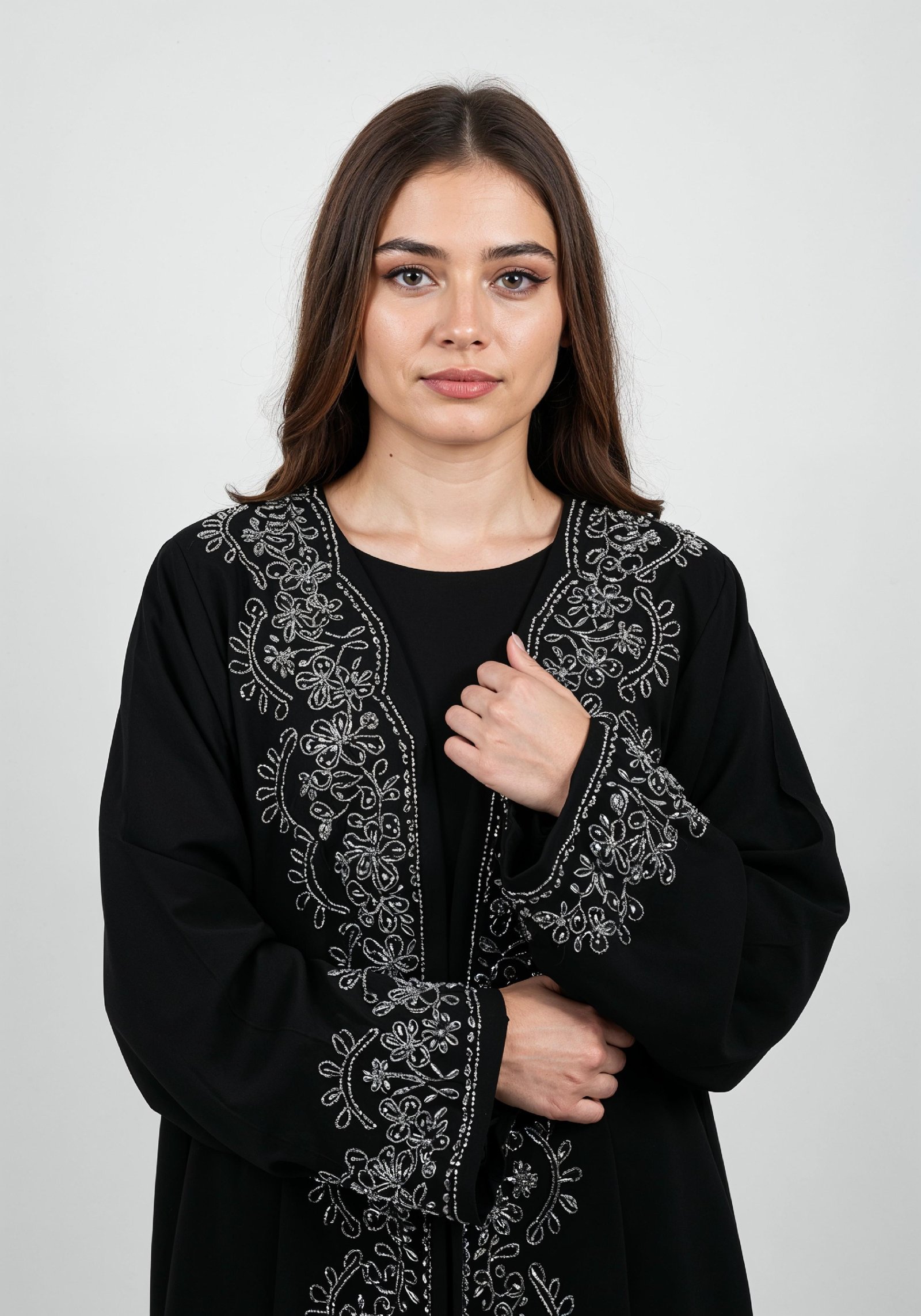 Elegant Muslim Woman in Black Embroidered Abaya and Hijab Full Length Fashion Portrait