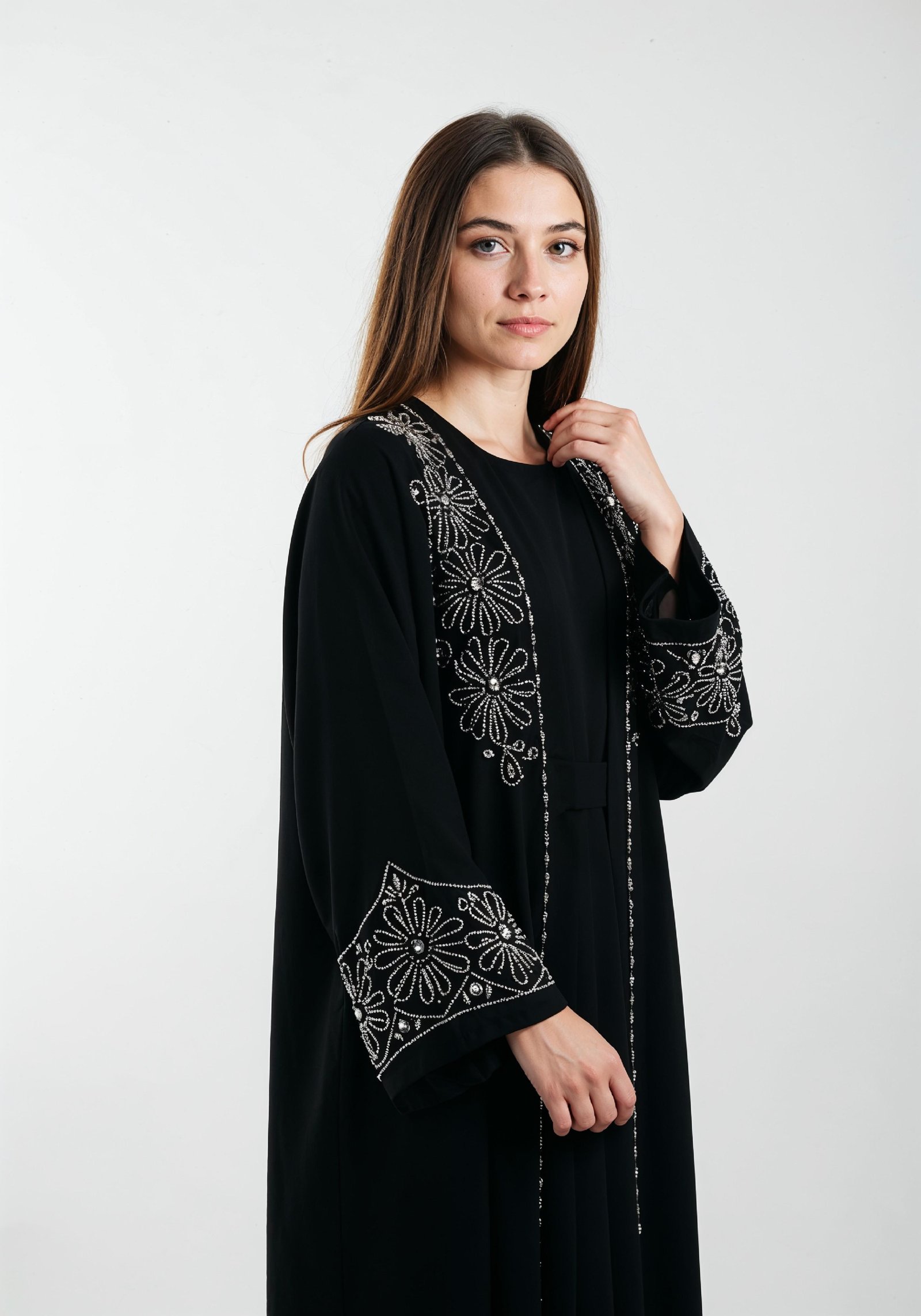 Elegant Muslim Woman in Black Embroidered Abaya and Hijab Full Length Fashion Portrait