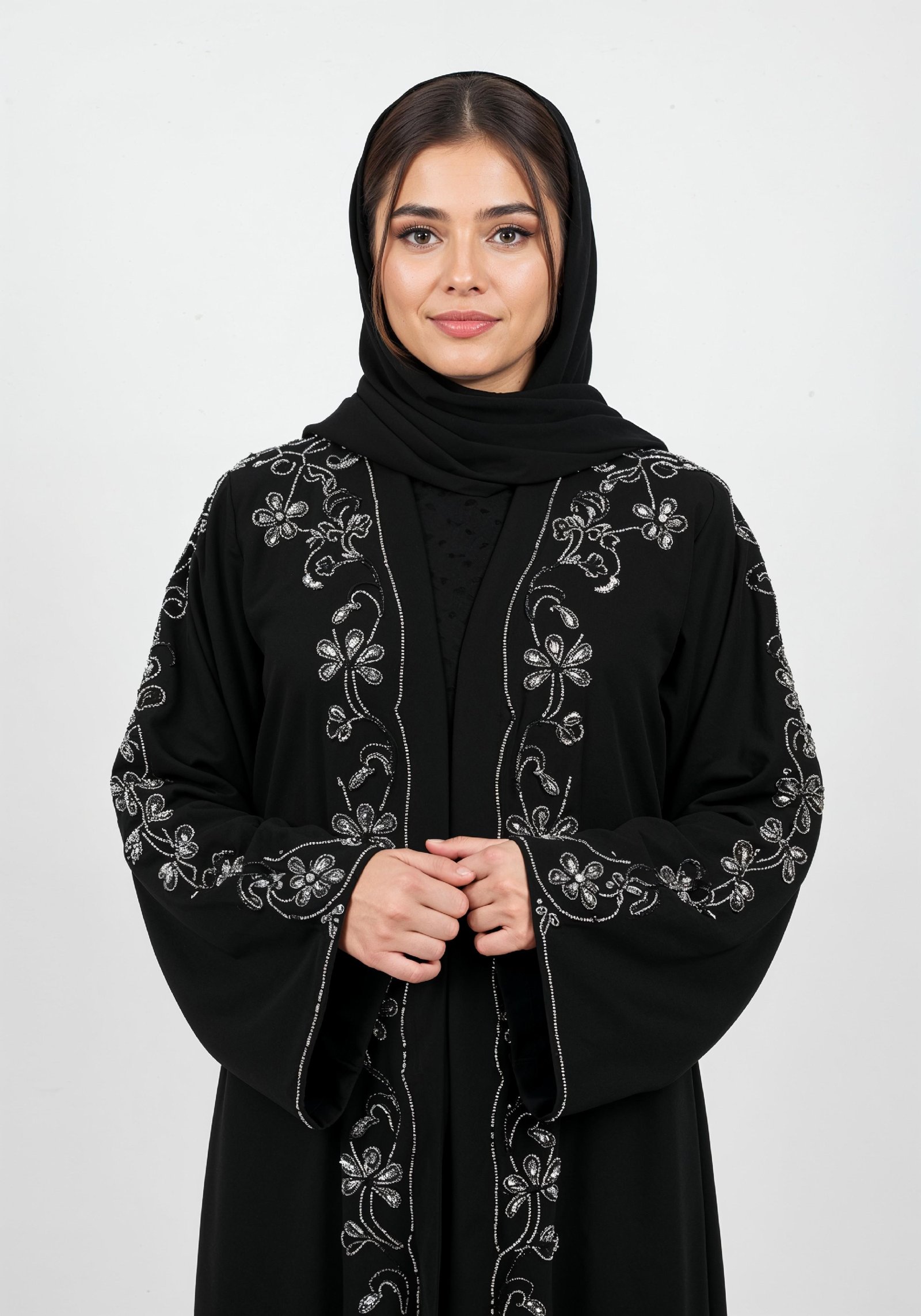 Elegant Muslim Woman in Black Embroidered Abaya and Hijab Full Length Fashion Portrait