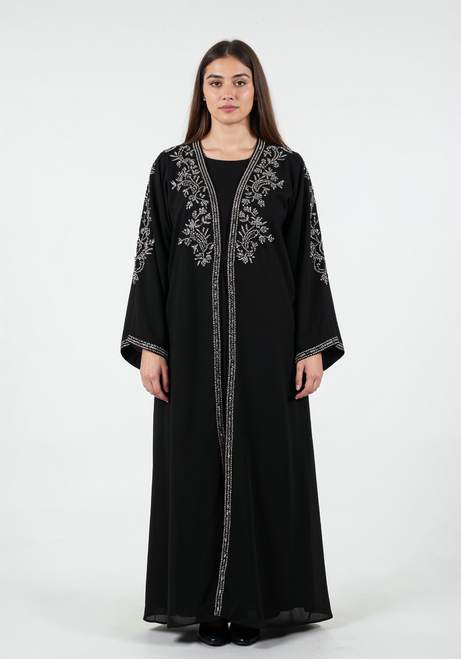 Elegant Muslim Woman in Black Embroidered Abaya and Hijab Full Length Fashion Portrait