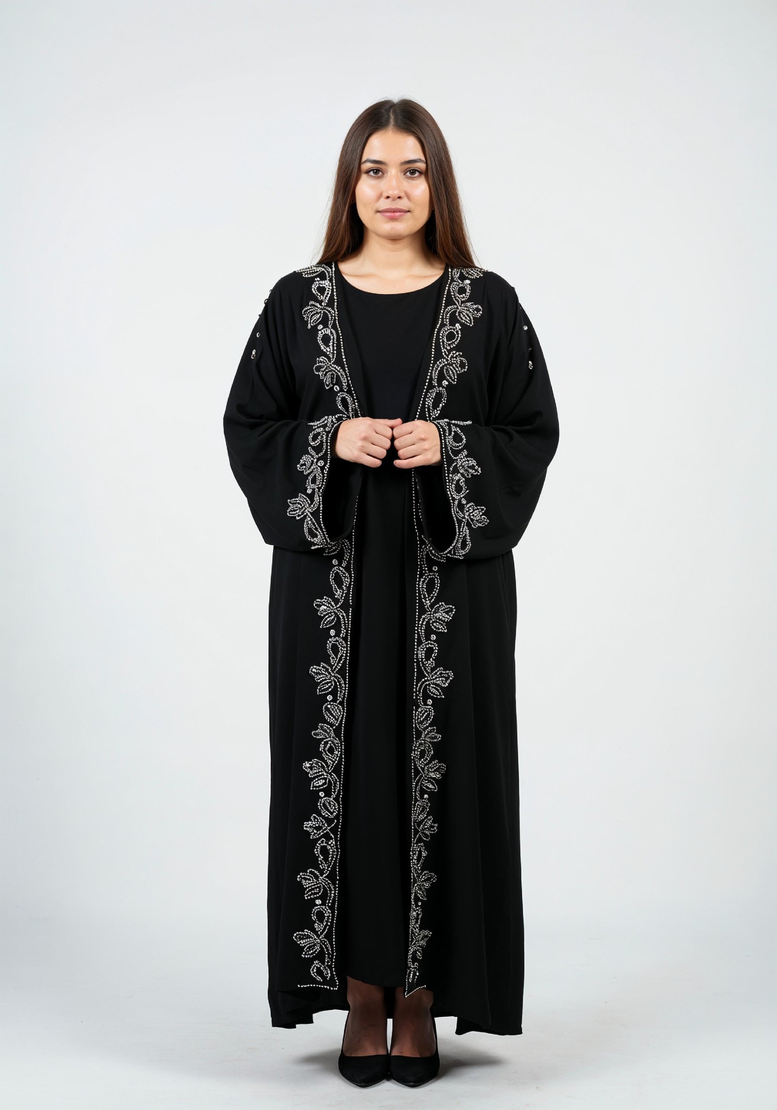 Elegant Muslim Woman in Black Embroidered Abaya and Hijab Full Length Fashion Portrait