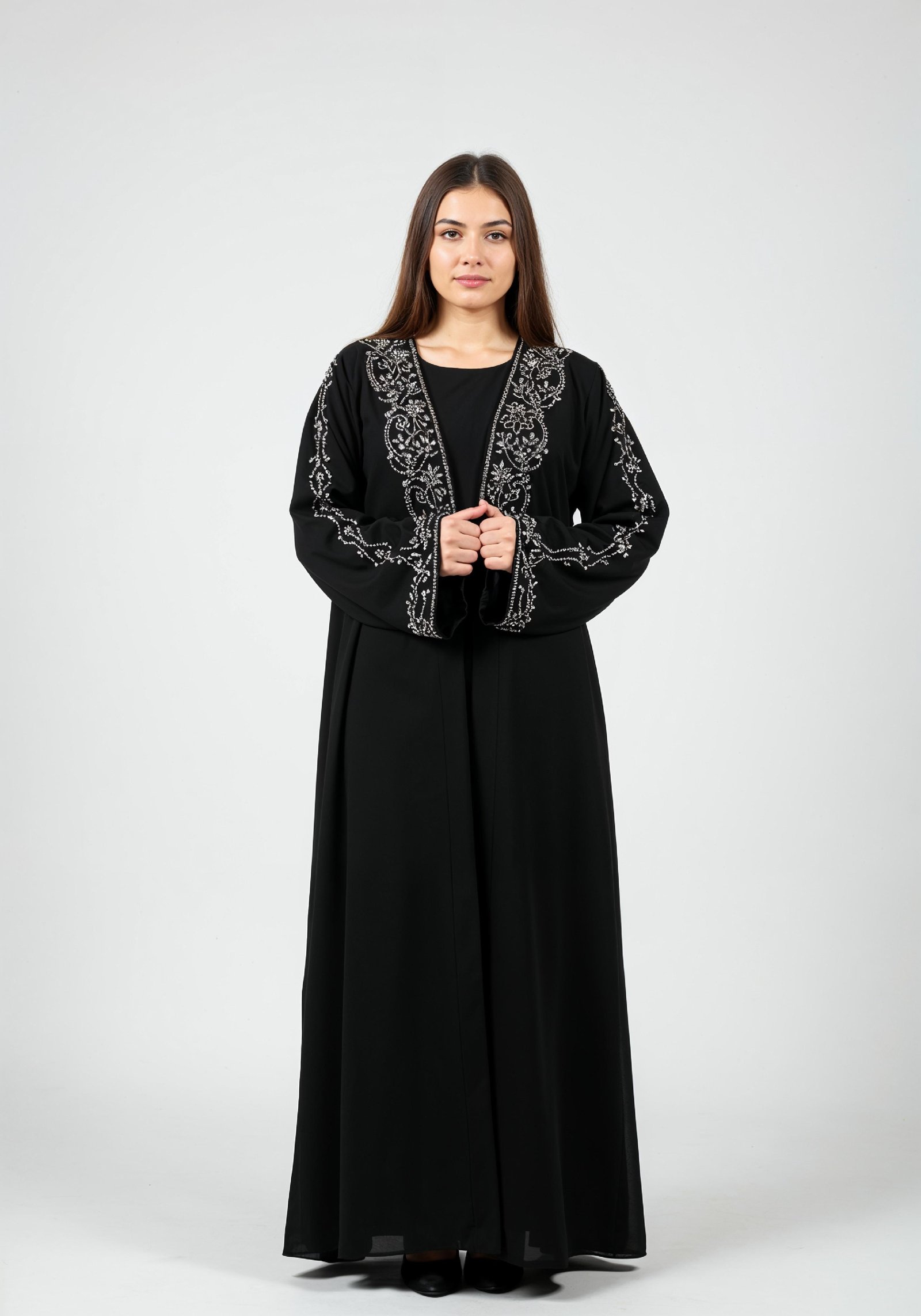 Elegant Muslim Woman in Black Embroidered Abaya and Hijab Full Length Fashion Portrait