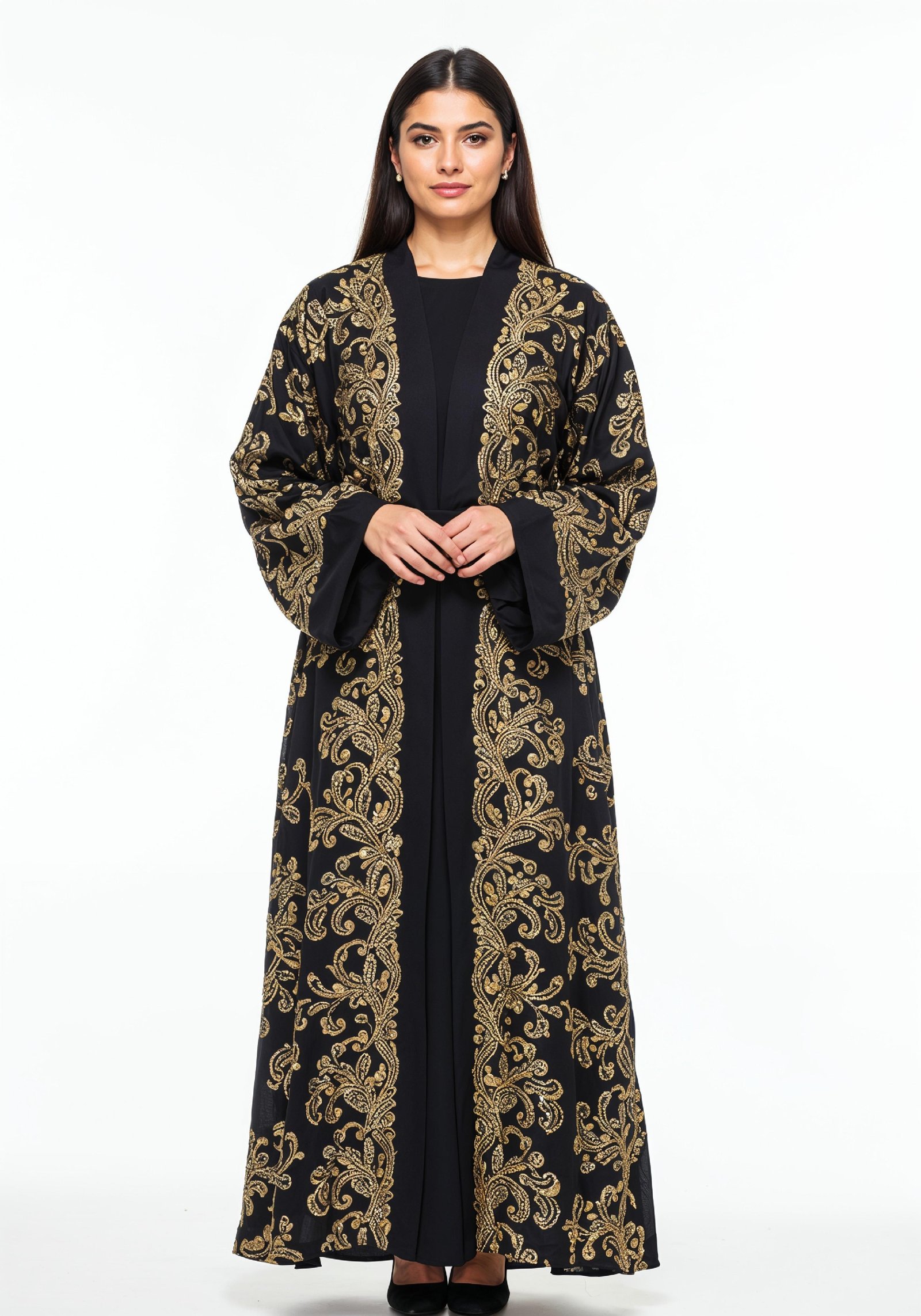 Elegant Muslim Woman Wearing Luxury Black and Gold Embroidered Abaya