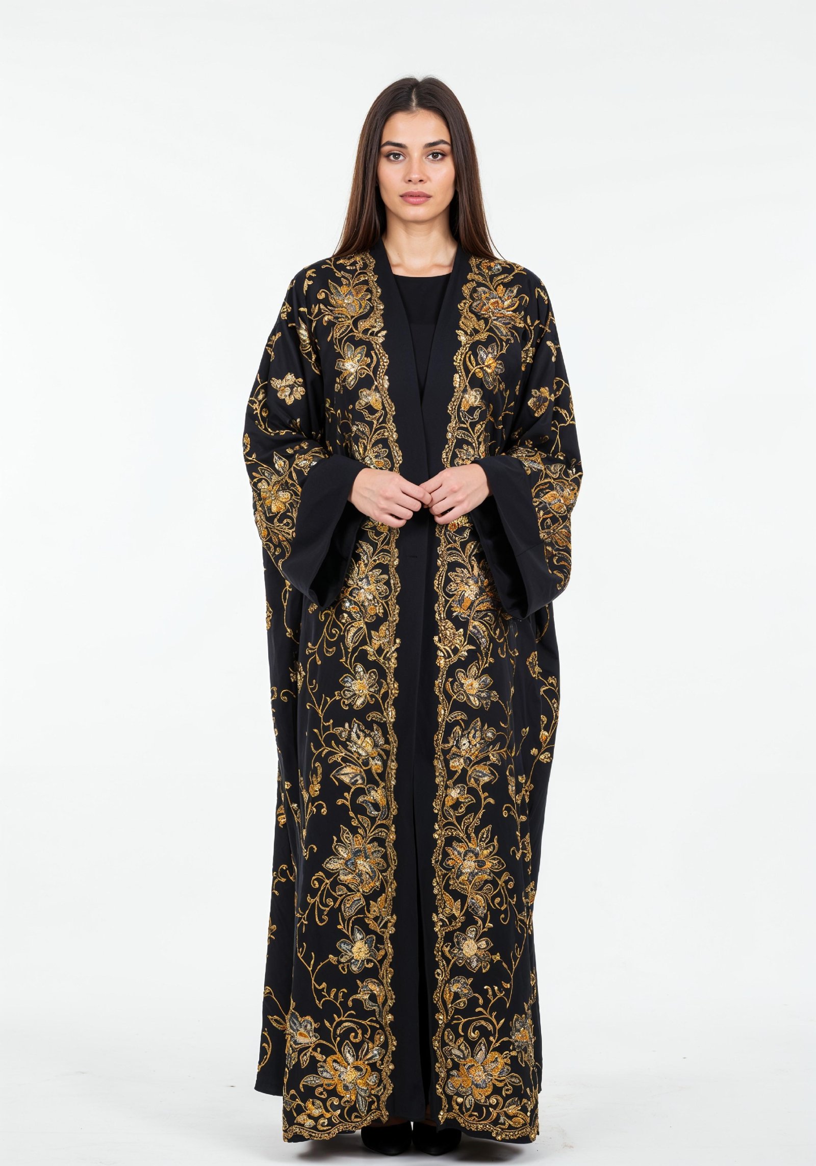 Elegant Muslim Woman Wearing Luxury Black and Gold Embroidered Abaya
