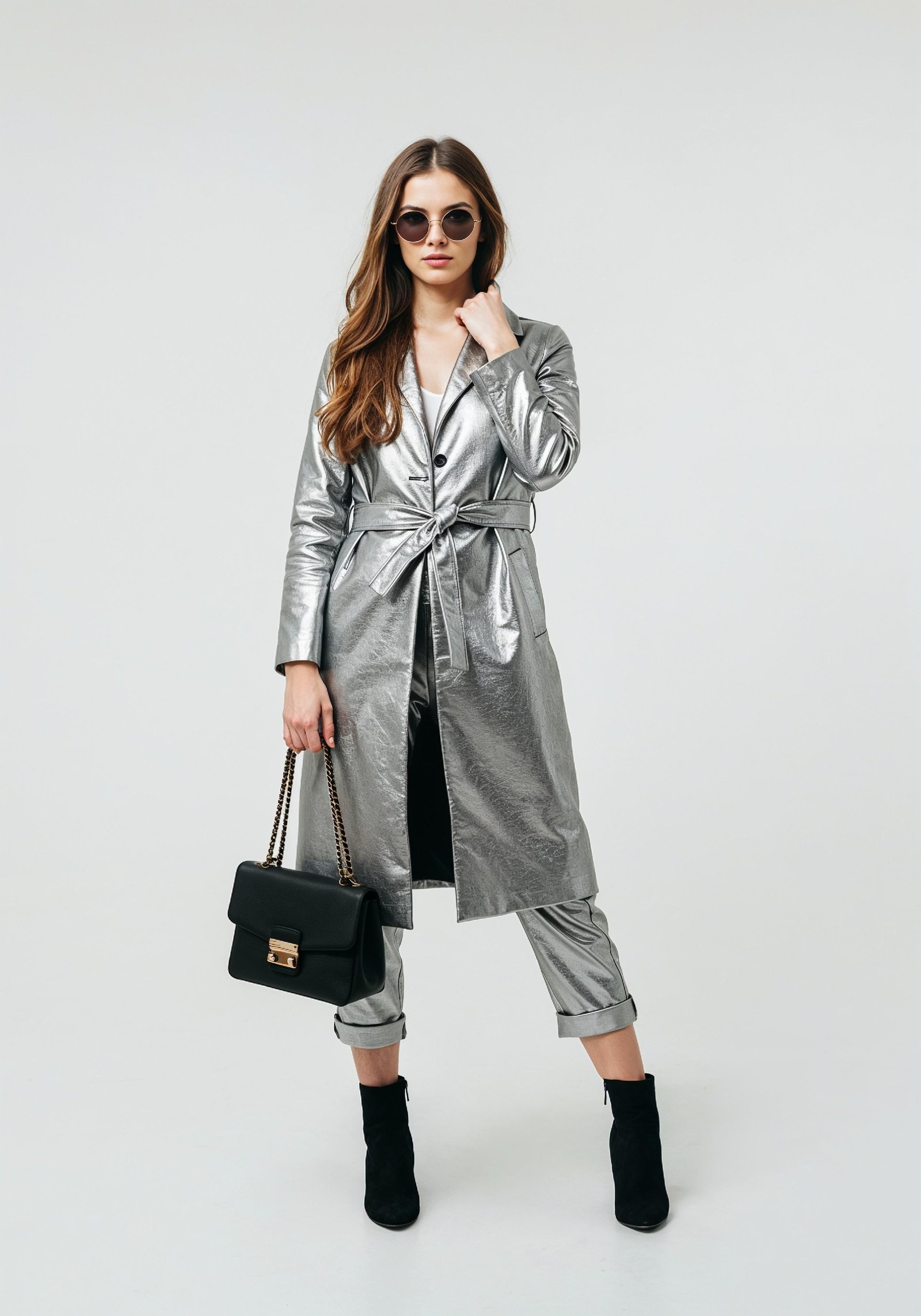 Elegant Young Woman in Coat and Matching Trousers Fashion Portrait