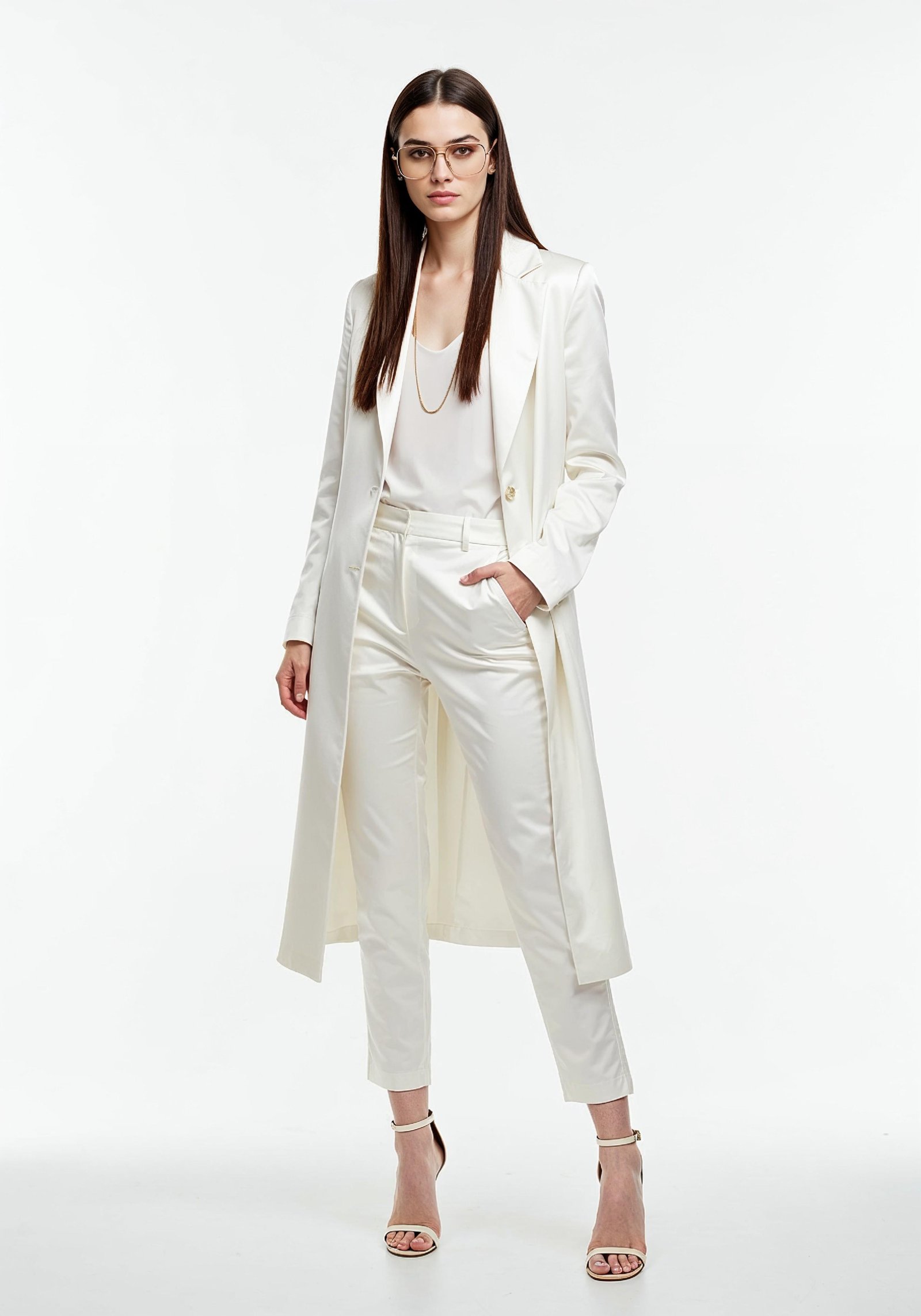 Elegant Young Woman in Coat and Matching Trousers Fashion Portrait