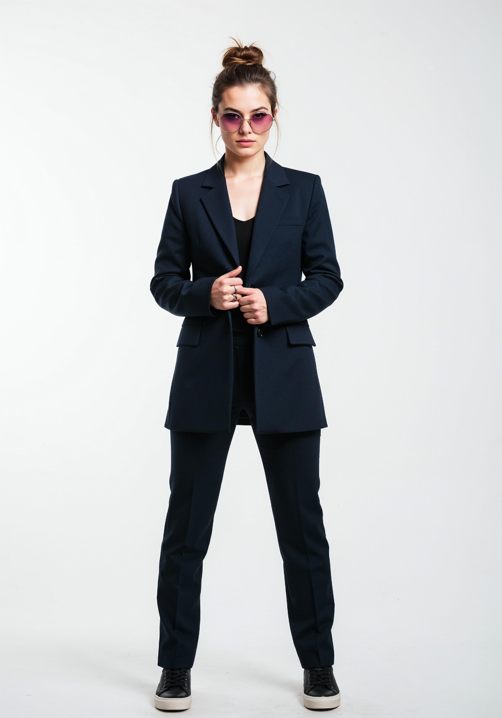 Elegant Young Woman in Coat and Matching Trousers Fashion Portrait