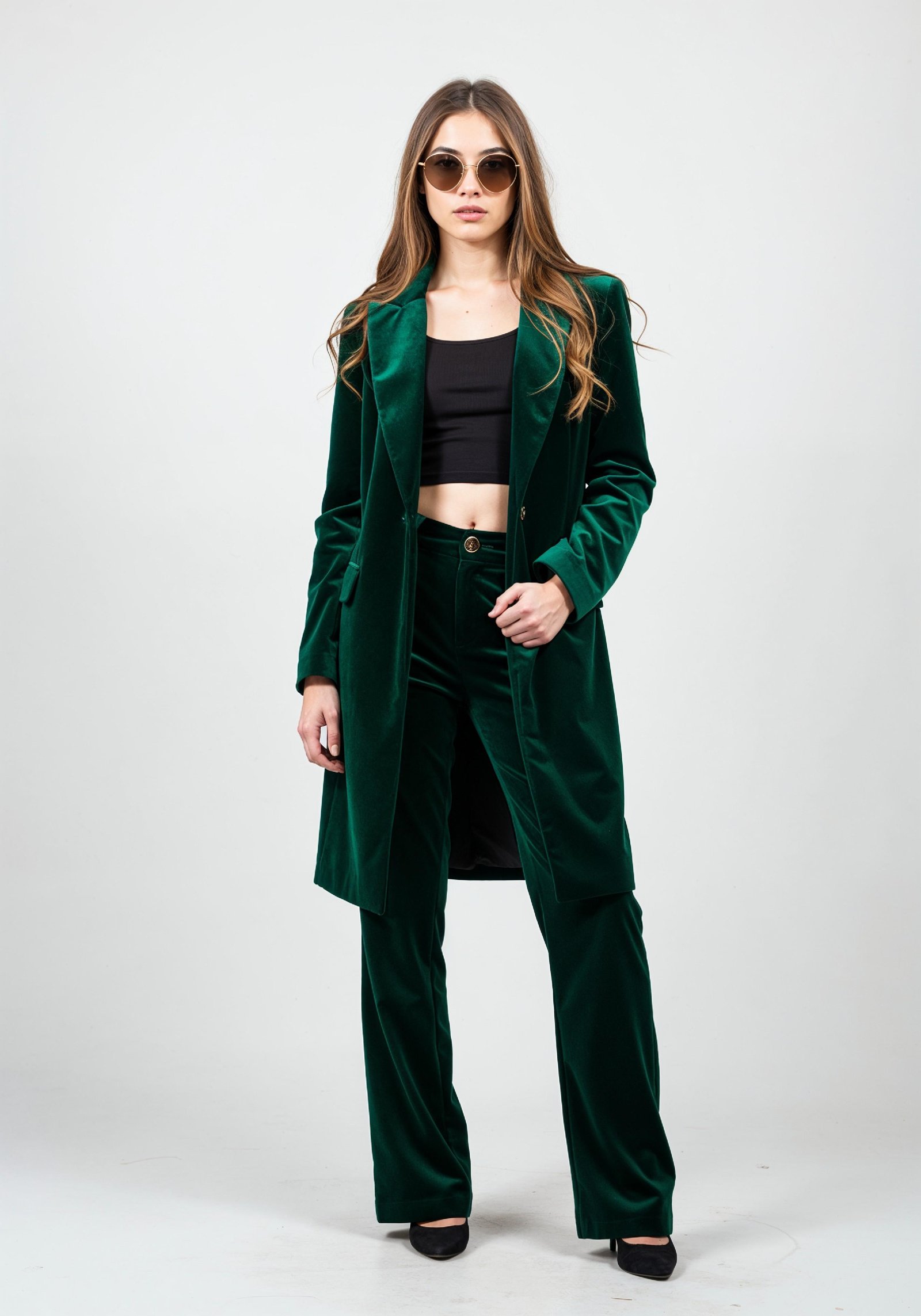 Elegant Young Woman in Coat and Matching Trousers Fashion Portrait