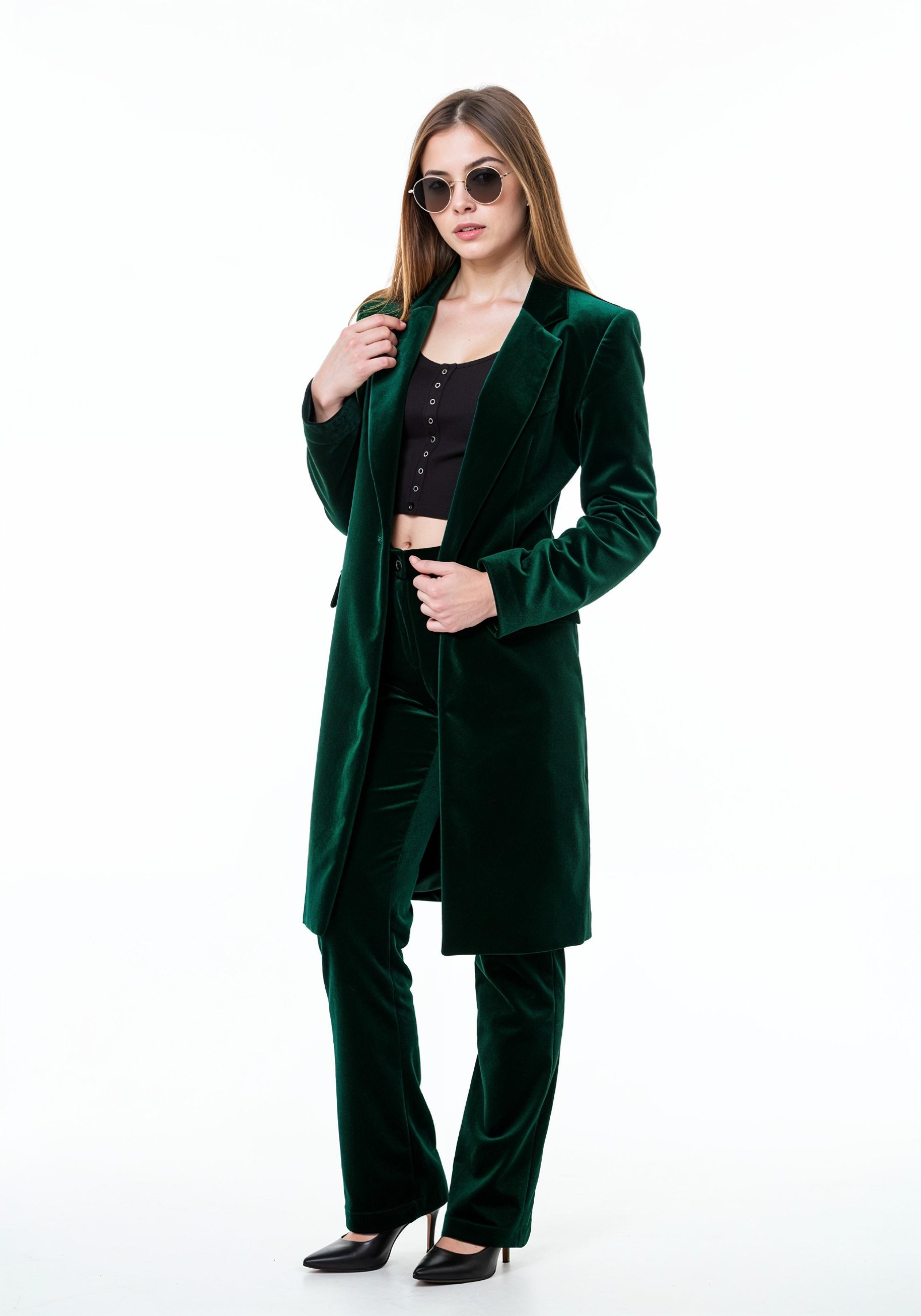 Elegant Young Woman in Coat and Matching Trousers Fashion Portrait
