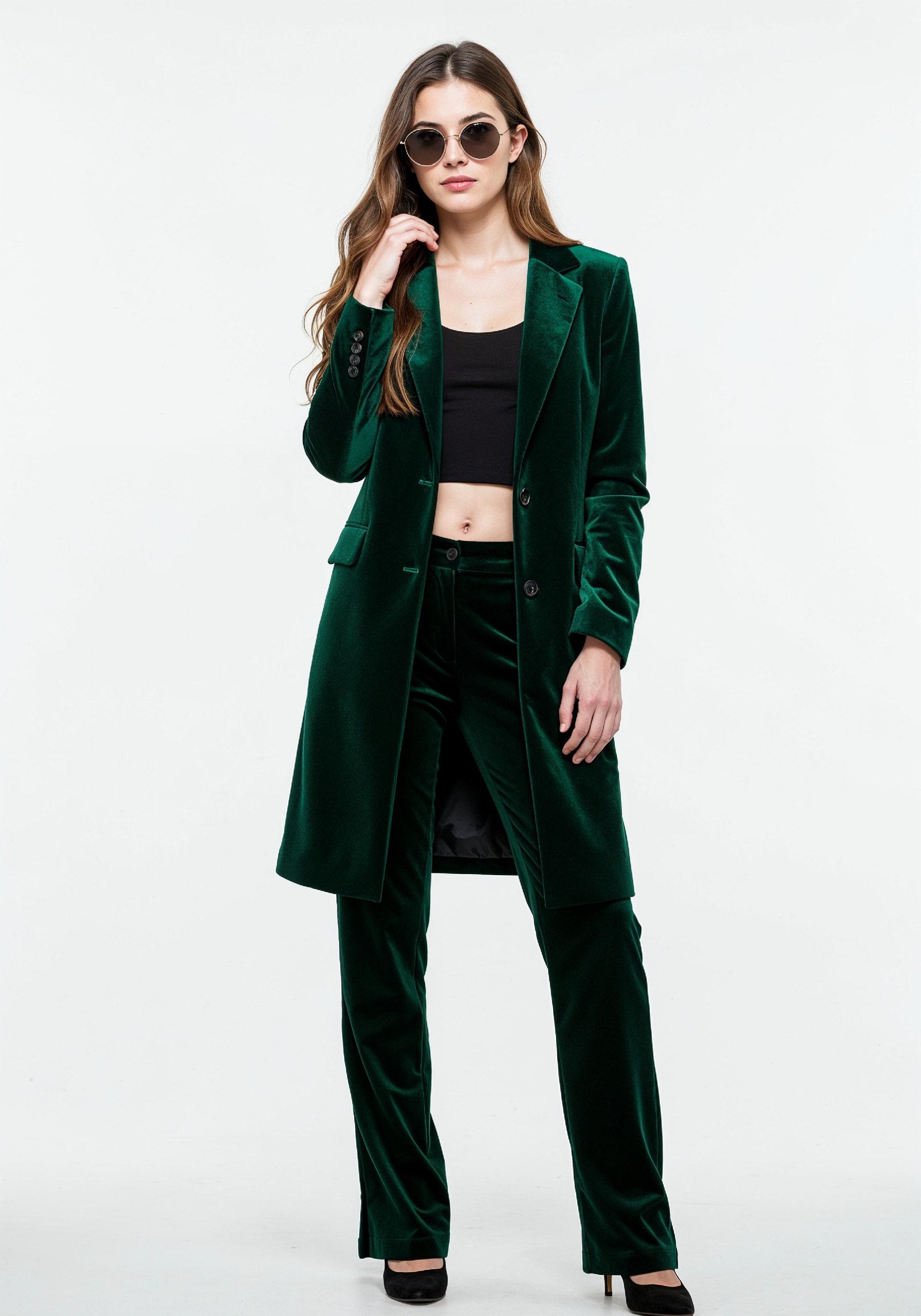 Elegant Young Woman in Coat and Matching Trousers Fashion Portrait