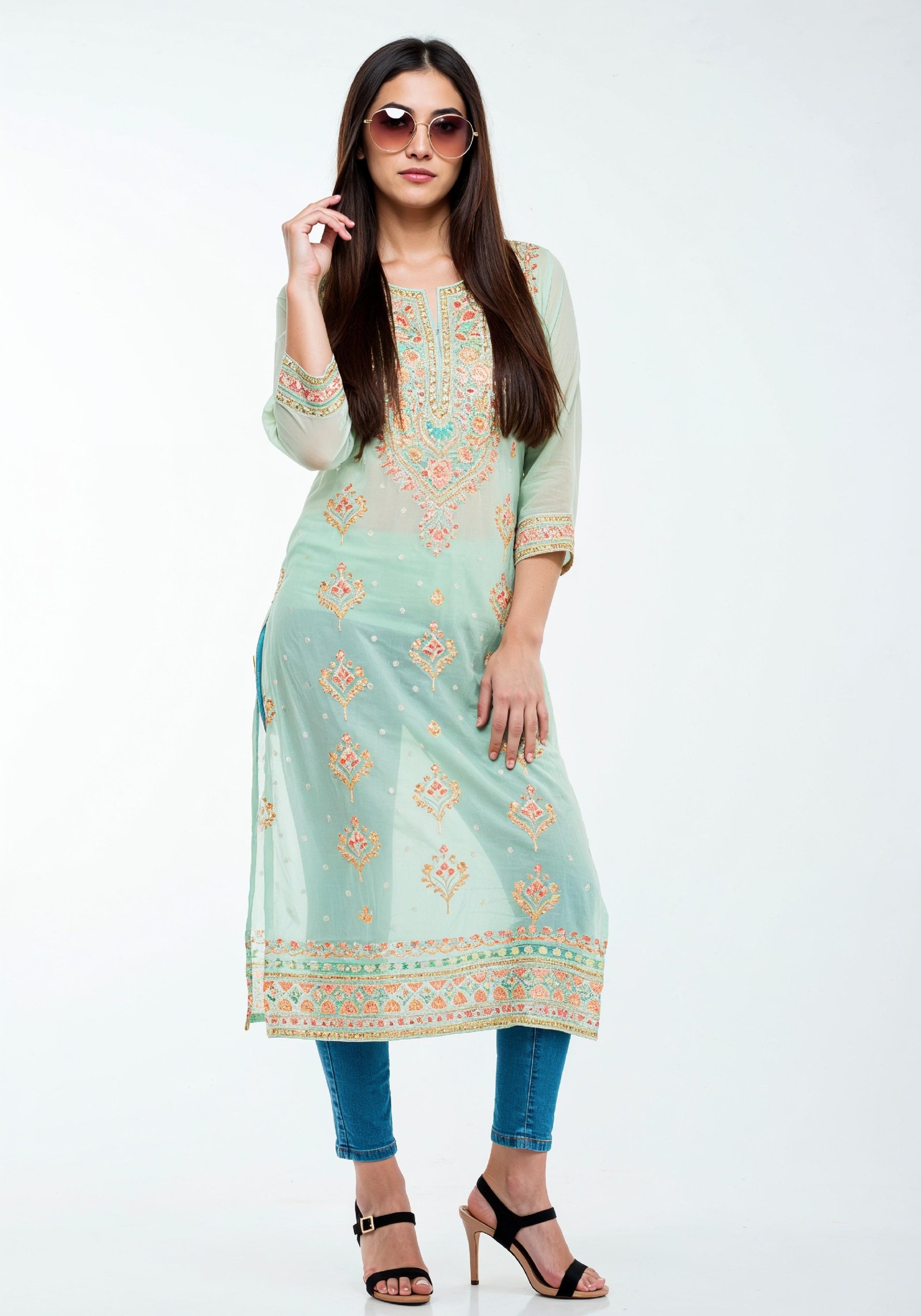Elegant Young Woman in Traditional Printed Kurti and Jeans Ethnic Fashion Portrait