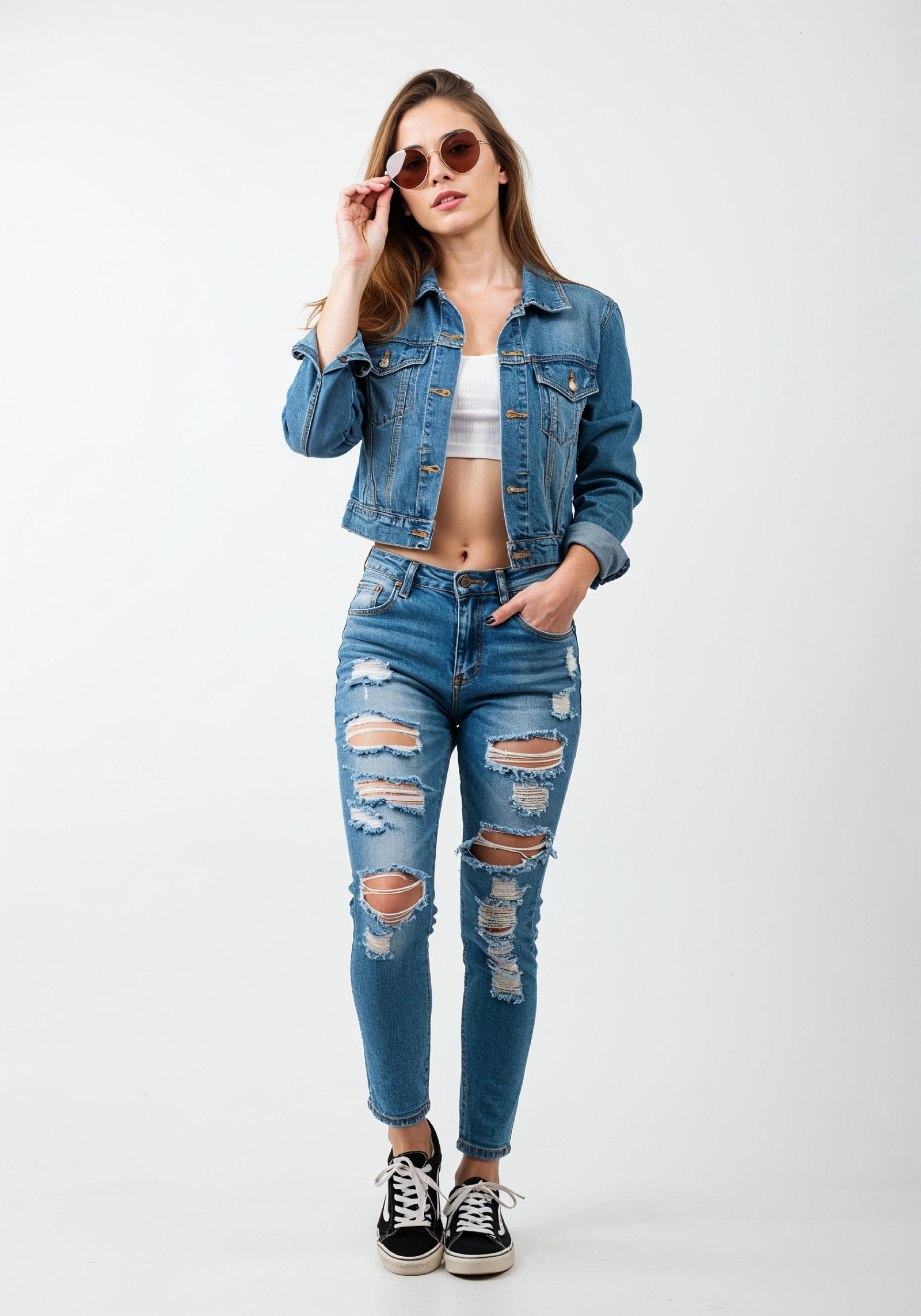 Fashionable Young Woman in Ripped Denim Jeans and Jacket Casual Street Style Portrait
