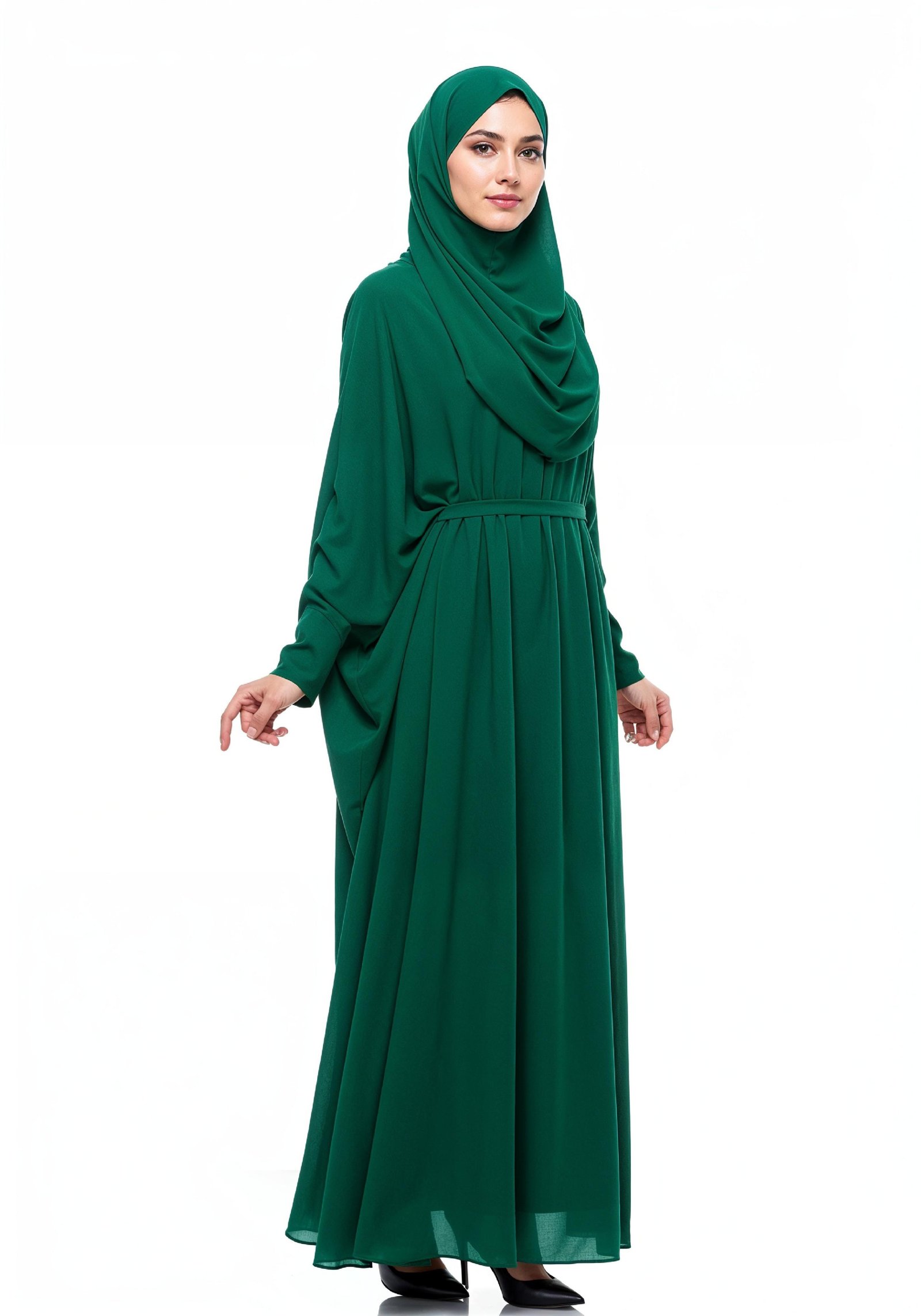 Graceful Muslim Woman Wearing Elegant Emerald Green Abaya and Hijab