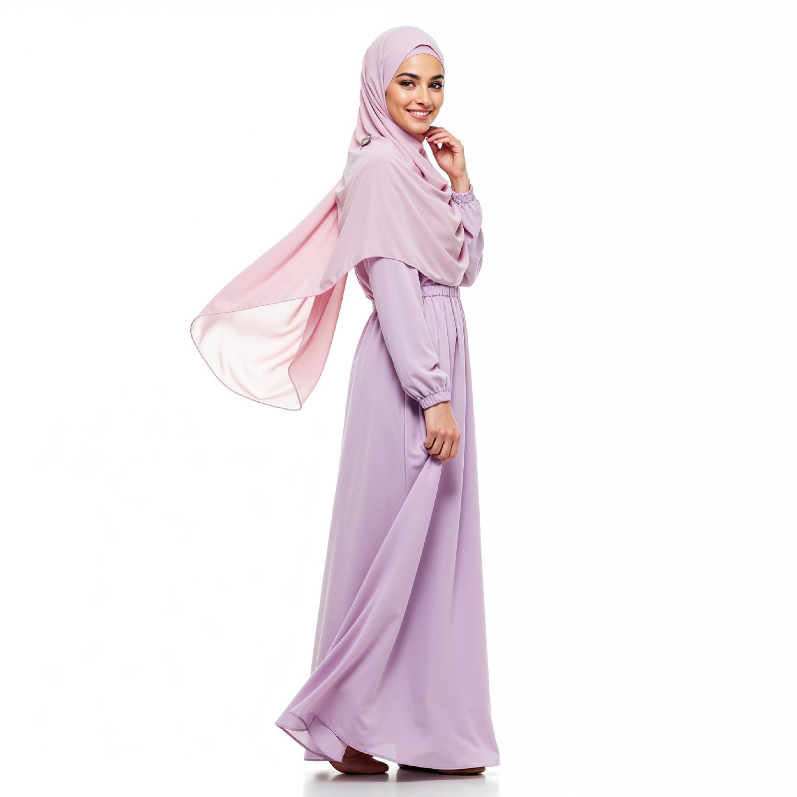 Graceful Young Muslim Woman Wearing Pastel Hijab and Elegant Modest Dress in Studio Portrait