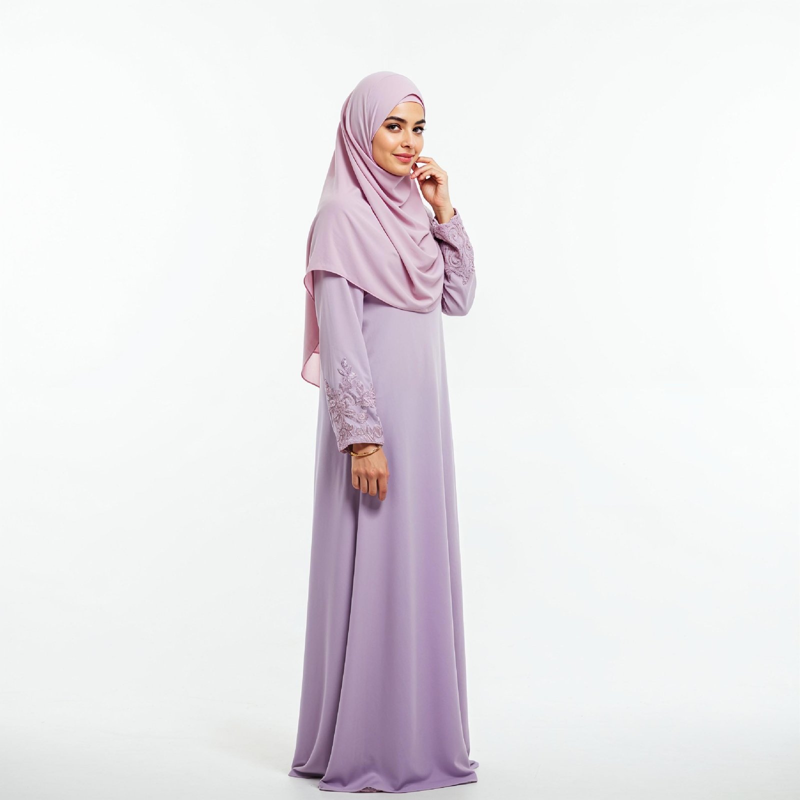 Graceful Young Muslim Woman Wearing Pastel Hijab and Elegant Modest Dress in Studio Portrait