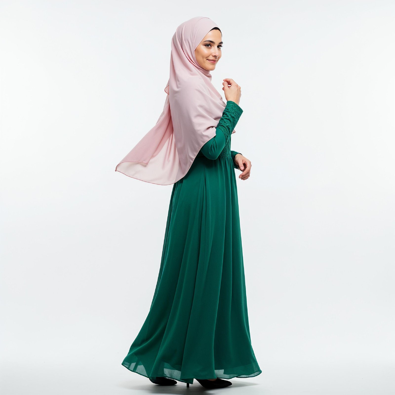 Graceful Young Muslim Woman Wearing Pastel Hijab and Elegant Modest Dress in Studio Portrait