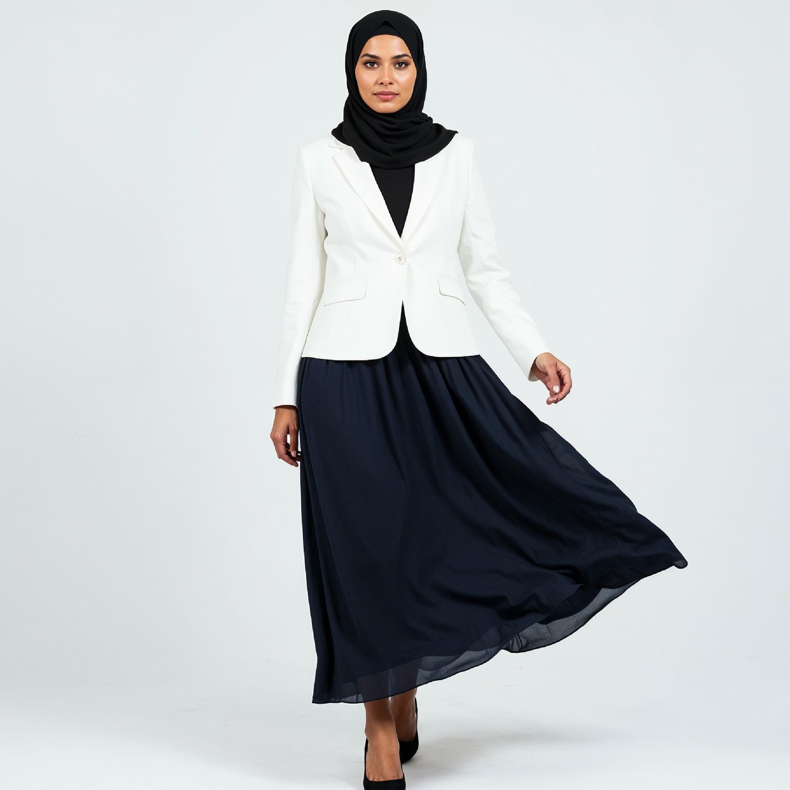 Professional Muslim Business Woman Wearing Hijab and Formal Suit in Studio Portrait