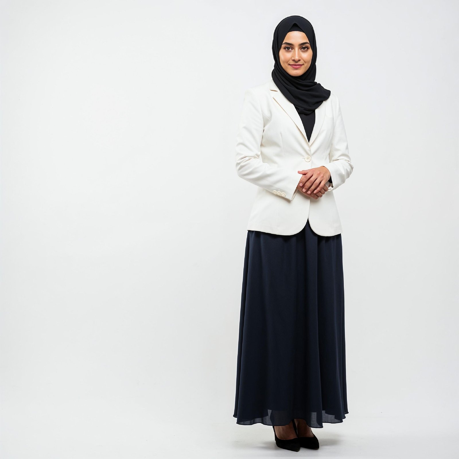 Professional Muslim Business Woman Wearing Hijab and Formal Suit in Studio Portrait