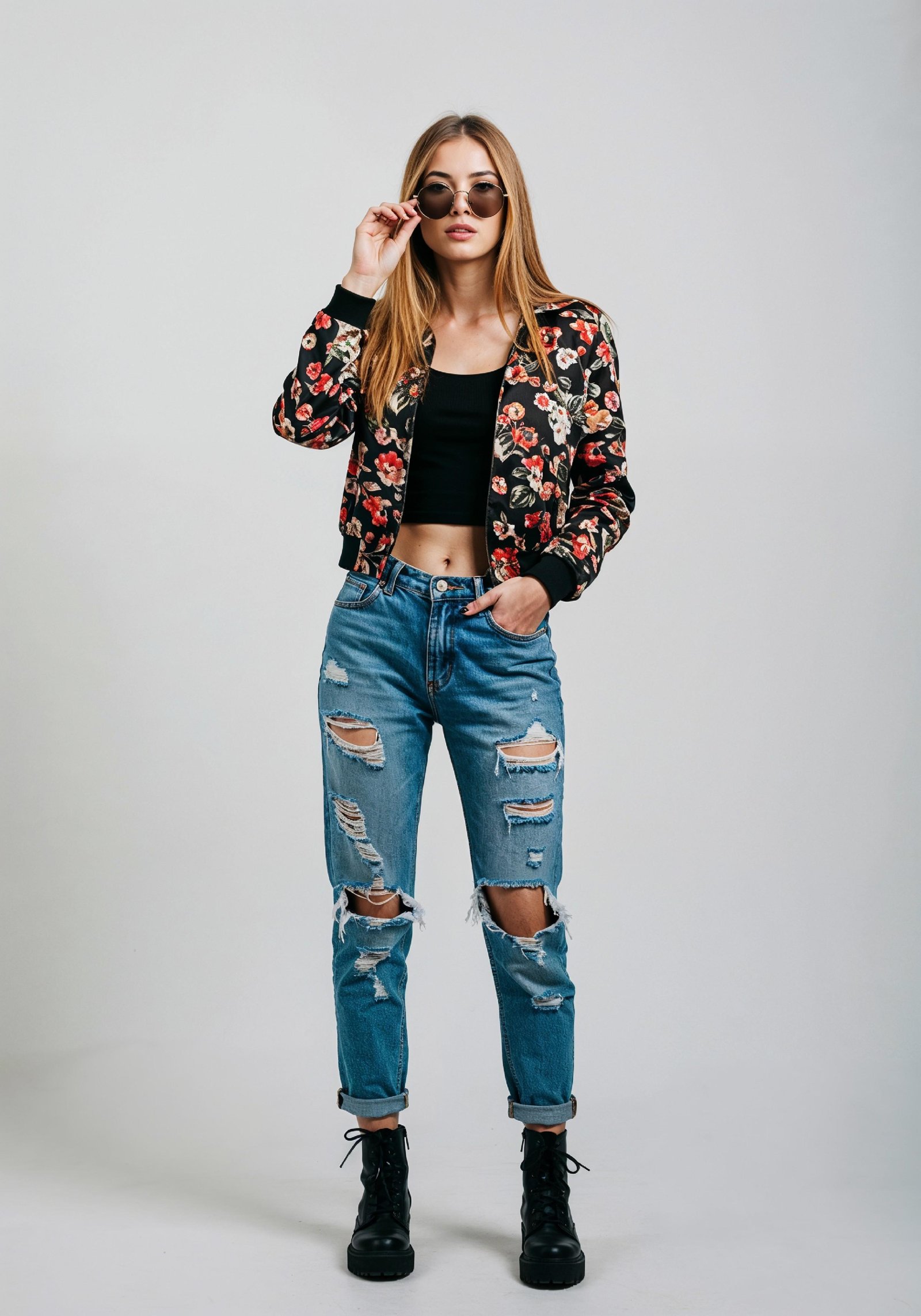 Stylish Young Woman in Floral Jacket and Ripped Jeans Trendy Street Fashion Portrait