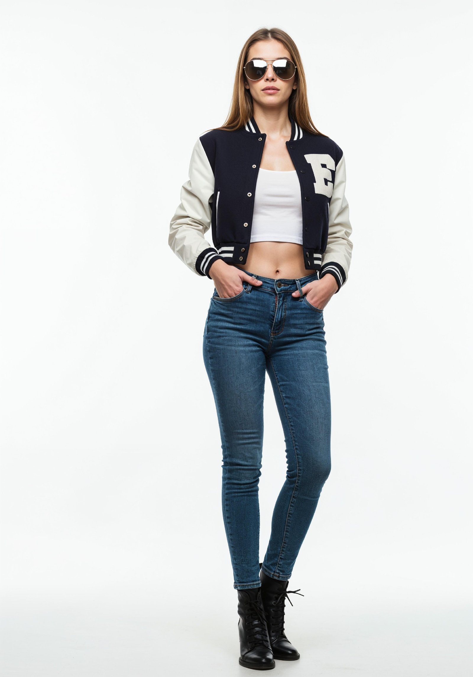 Stylish Young Woman in Varsity Jacket and Skinny Jeans Casual Fashion Portrait