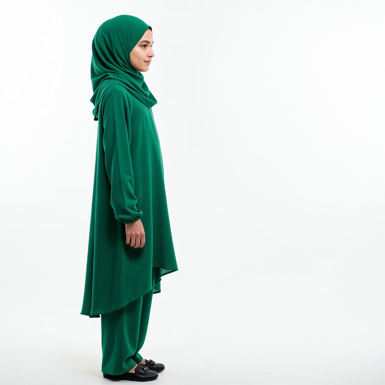 Young Islamic Girl Wearing Green Hijab and Modest Traditional Outfit Studio Portrait