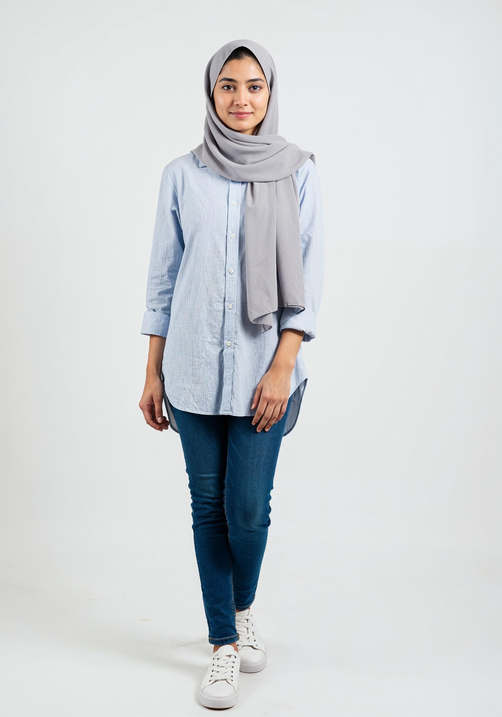 Young Muslim Woman in Modest Traditional Attire Educational Portrait