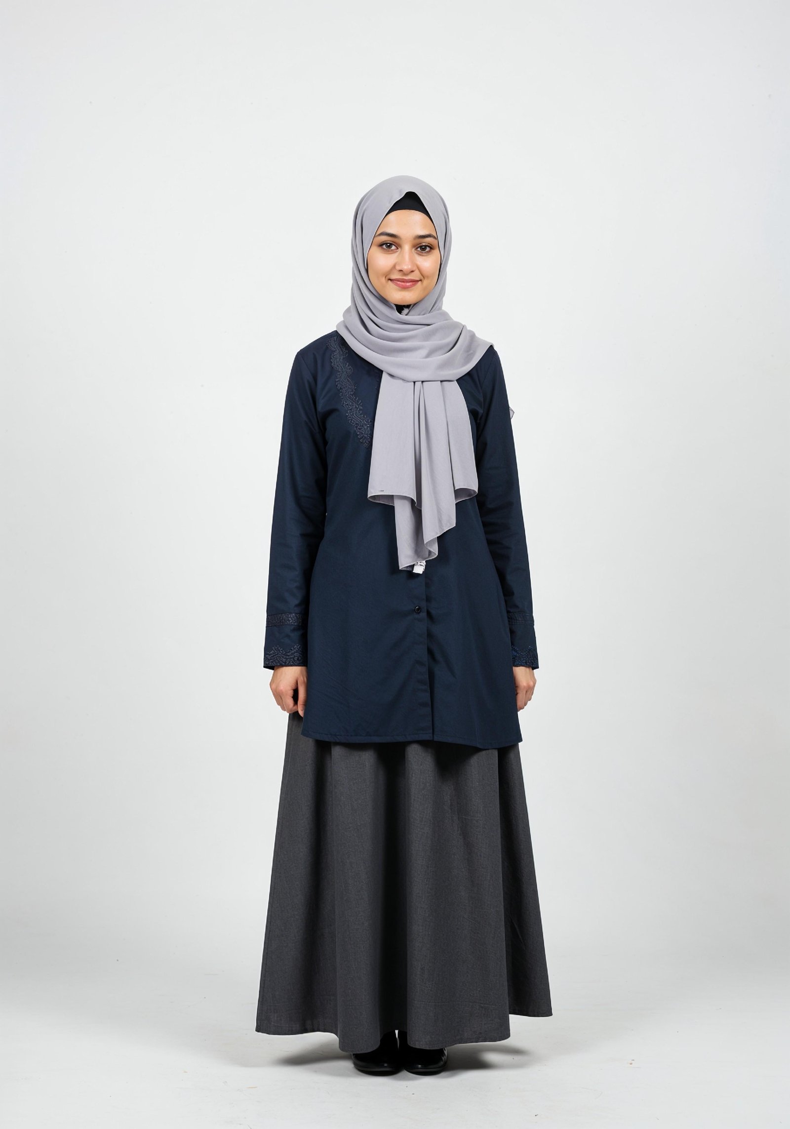 Young Muslim Woman in Modest Traditional Attire Educational Portrait