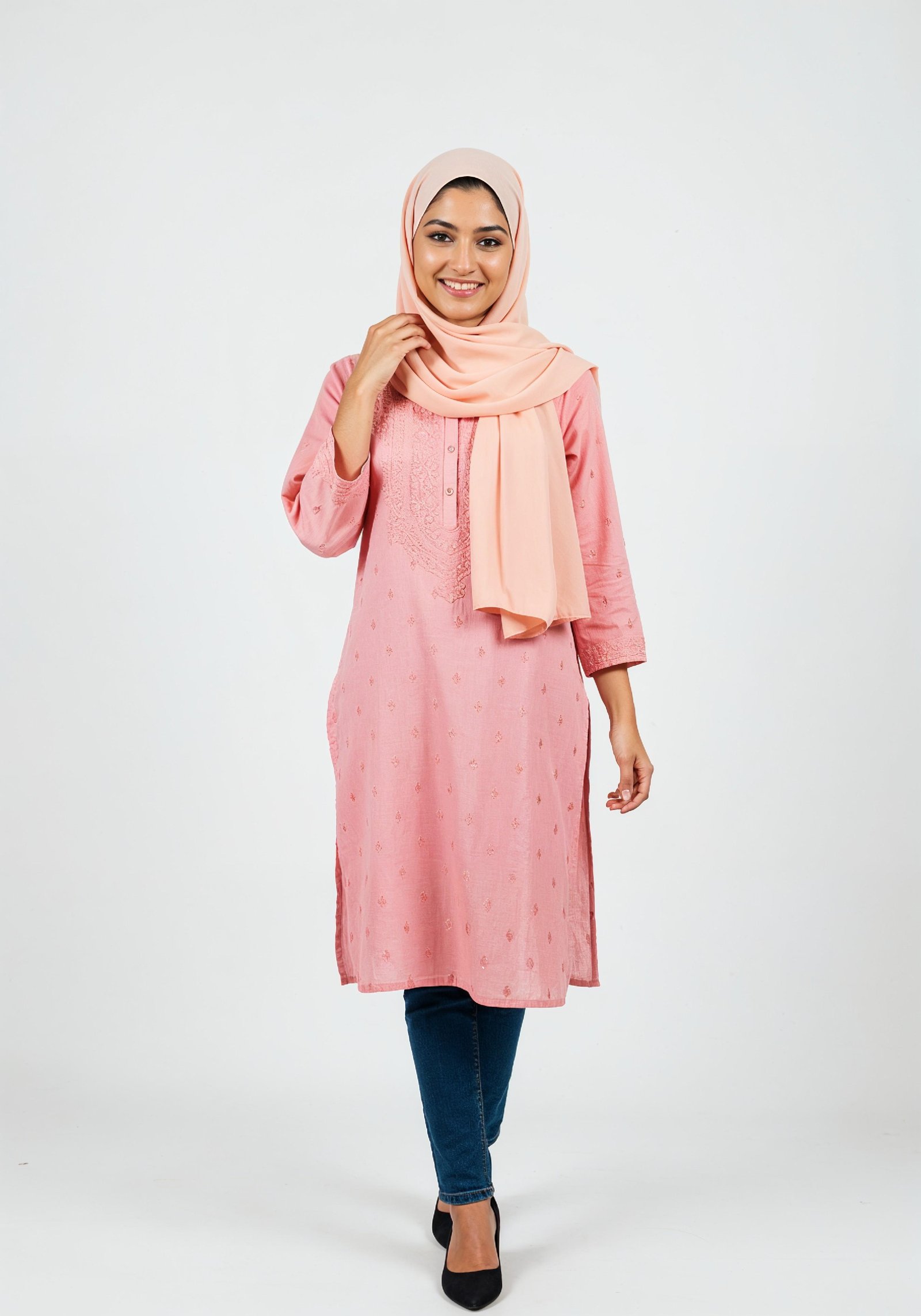 Young Muslim Woman in Modest Traditional Attire Educational Portrait