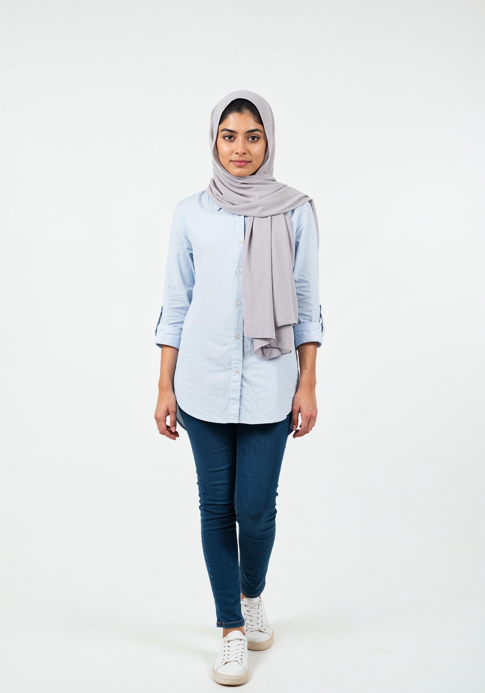 Young Muslim Woman in Modest Traditional Attire Educational Portrait