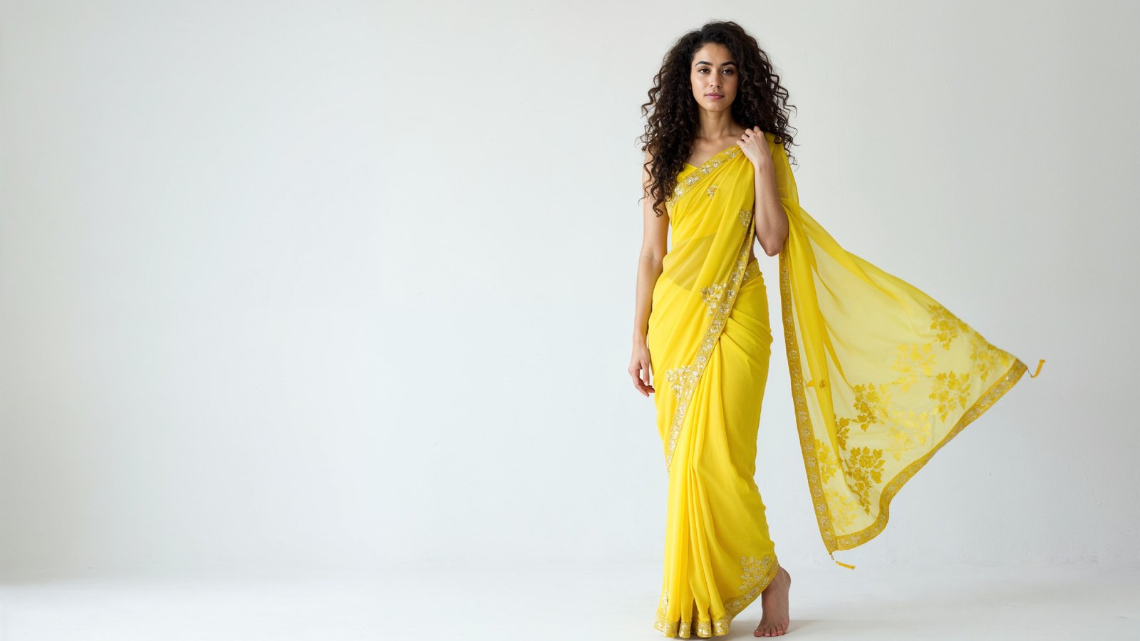 Beautiful Indian Woman Wearing Traditional Saree in Studio Portrait