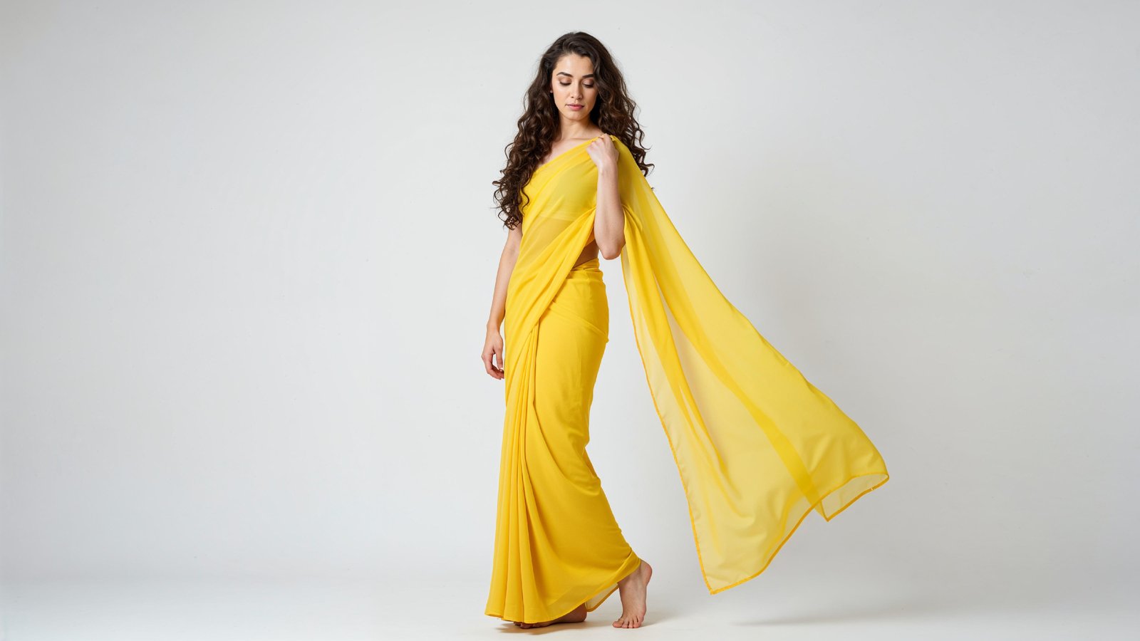 Beautiful Indian Woman Wearing Traditional Saree in Studio Portrait