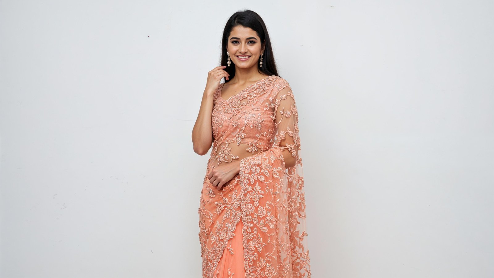 Beautiful Indian Woman Wearing Traditional Saree in Studio Portrait