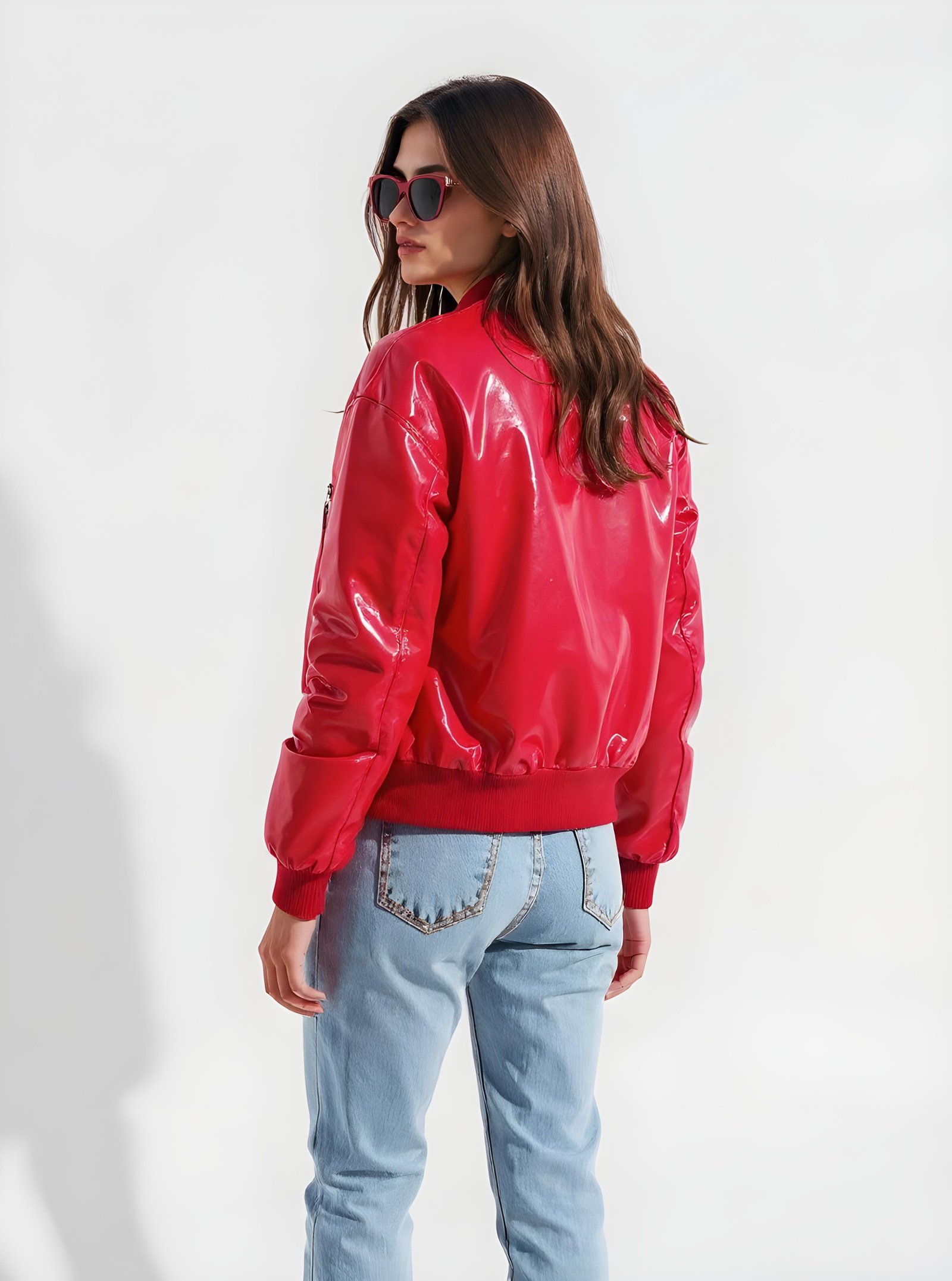 Stylish Woman Wearing Fashionable Leather Jacket and Sunglasses Isolated on White Background