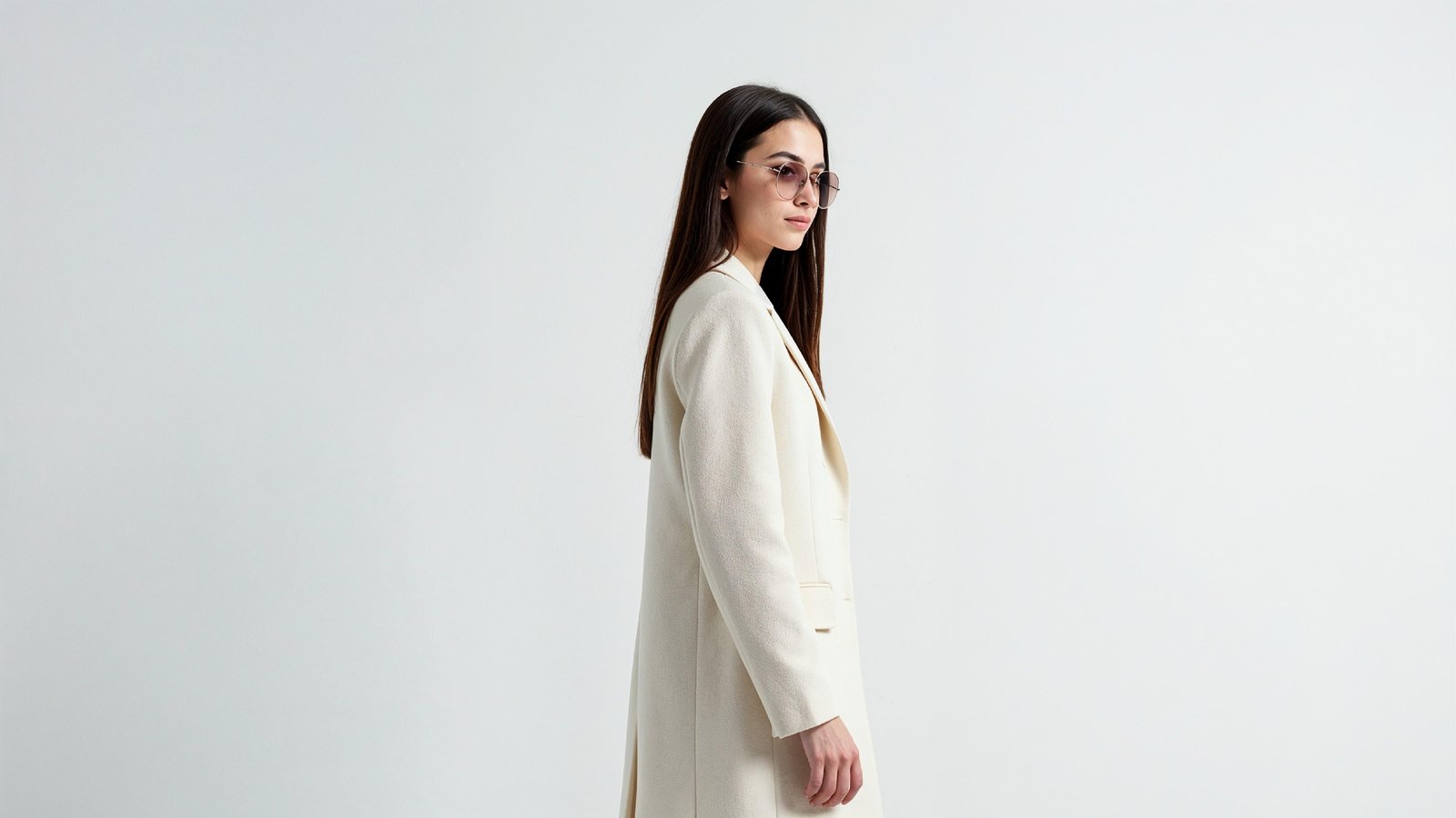 Stylish Young Woman Wearing Elegant Coat and Modern Fashion Outfit