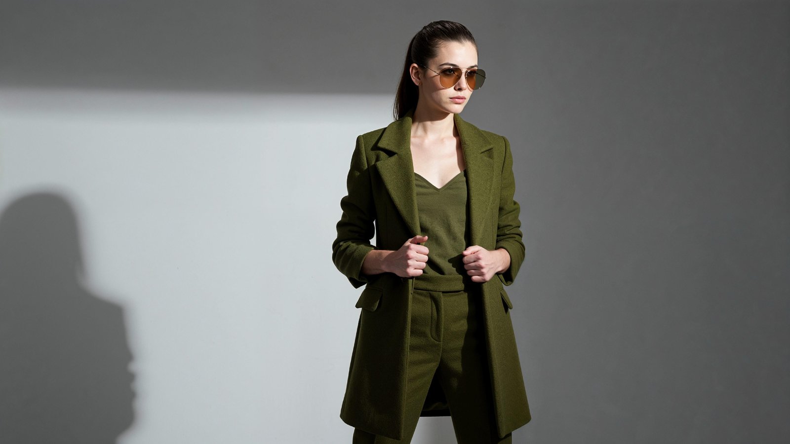 Stylish Young Woman Wearing Elegant Coat and Modern Fashion Outfit