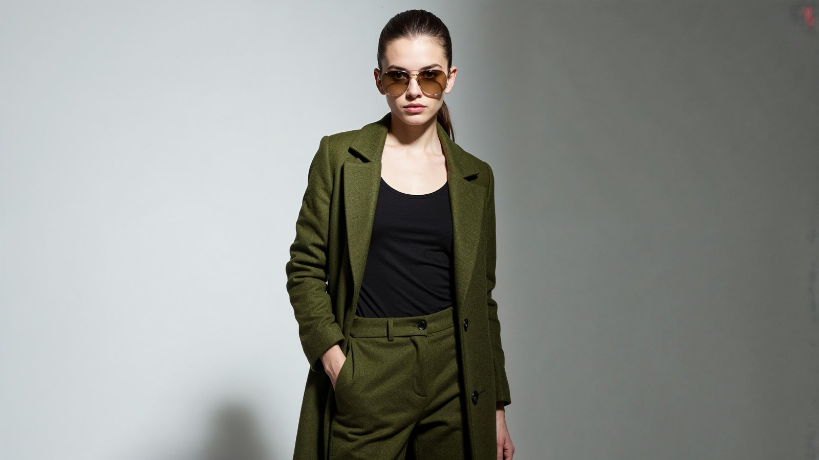 Stylish Young Woman Wearing Elegant Coat and Modern Fashion Outfit