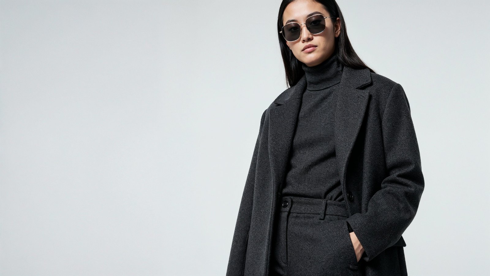 Stylish Young Woman Wearing Elegant Coat and Modern Fashion Outfit