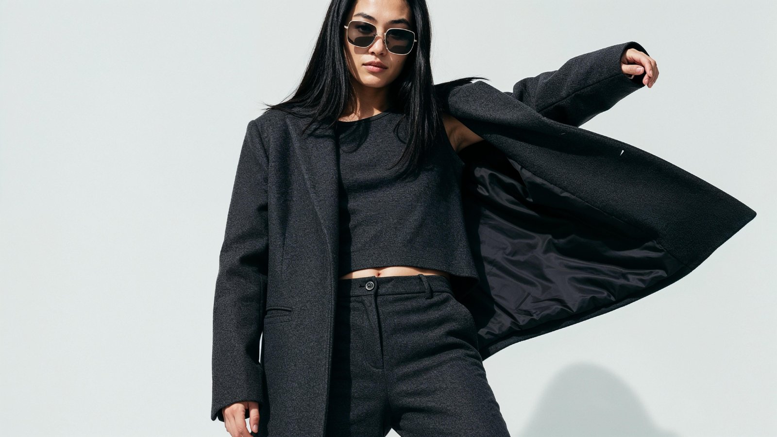 Stylish Young Woman Wearing Elegant Coat and Modern Fashion Outfit