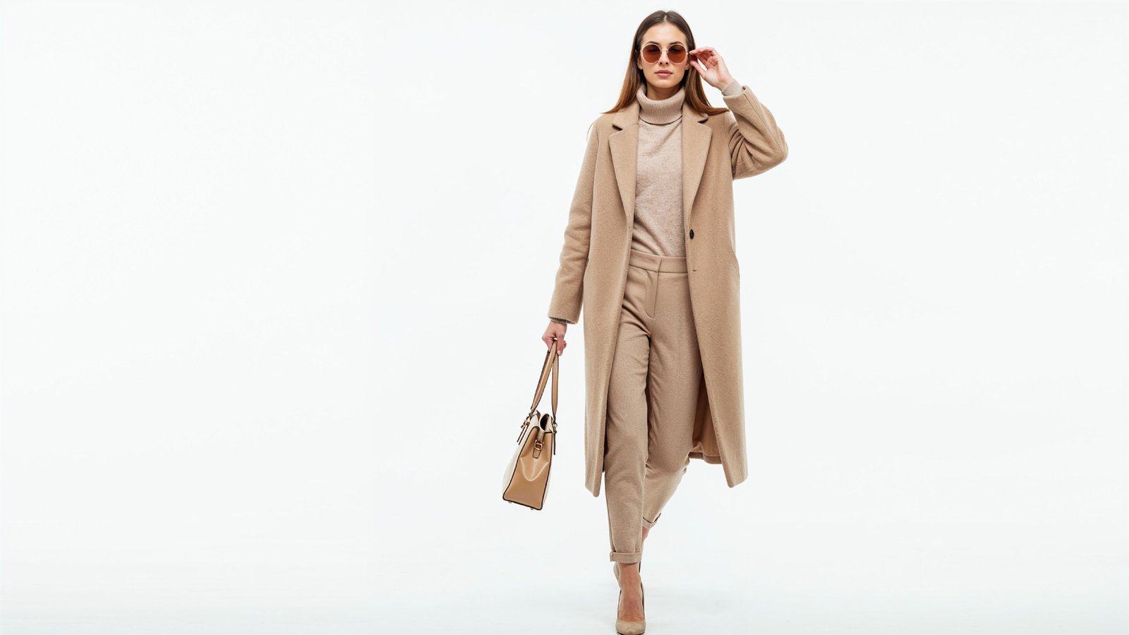 Stylish Young Woman Wearing Elegant Coat and Modern Fashion Outfit